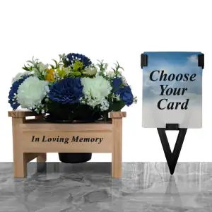 Artificial blue & honeydew carnations, and yellow & honeydew mini-roses, with gyp and greenery in a sturdy wooden 'In Loving Memory' memorial bench with plastic grave flower pot, plus a laminate memorial card for grandad, husband, or brother, or son in a plastic holder.