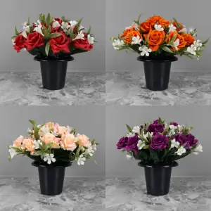 Artificial red/orange/peach/purple open roses, with weather-resistant plastic gyp and greenery in a black plastic grave flower pot.